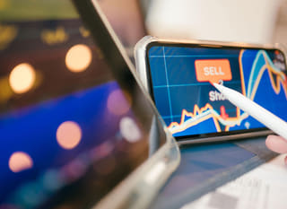 Multi-market trader analyzing Bitcoin Ethereum and forex options